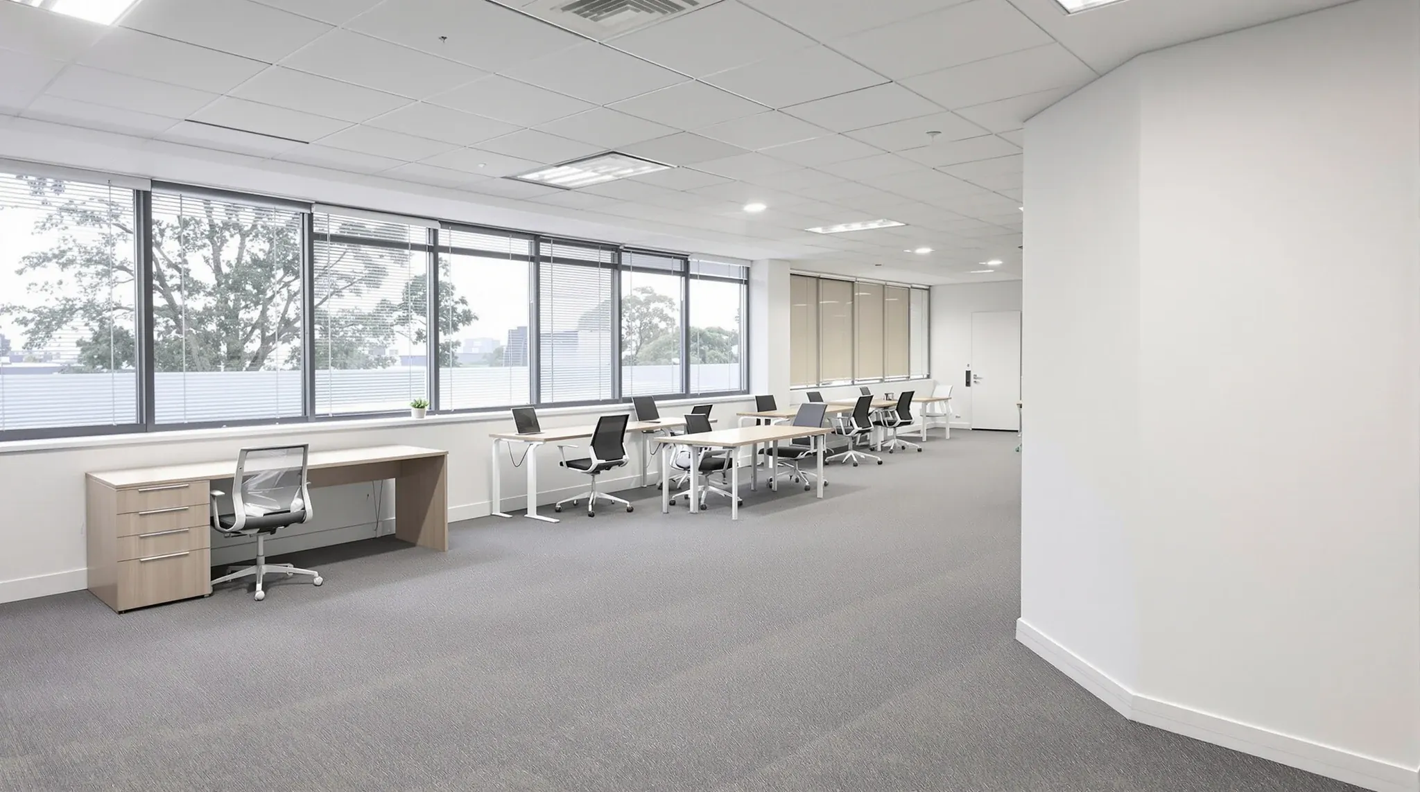 An empty finished spec suite office floor ready for a new tenant to move in