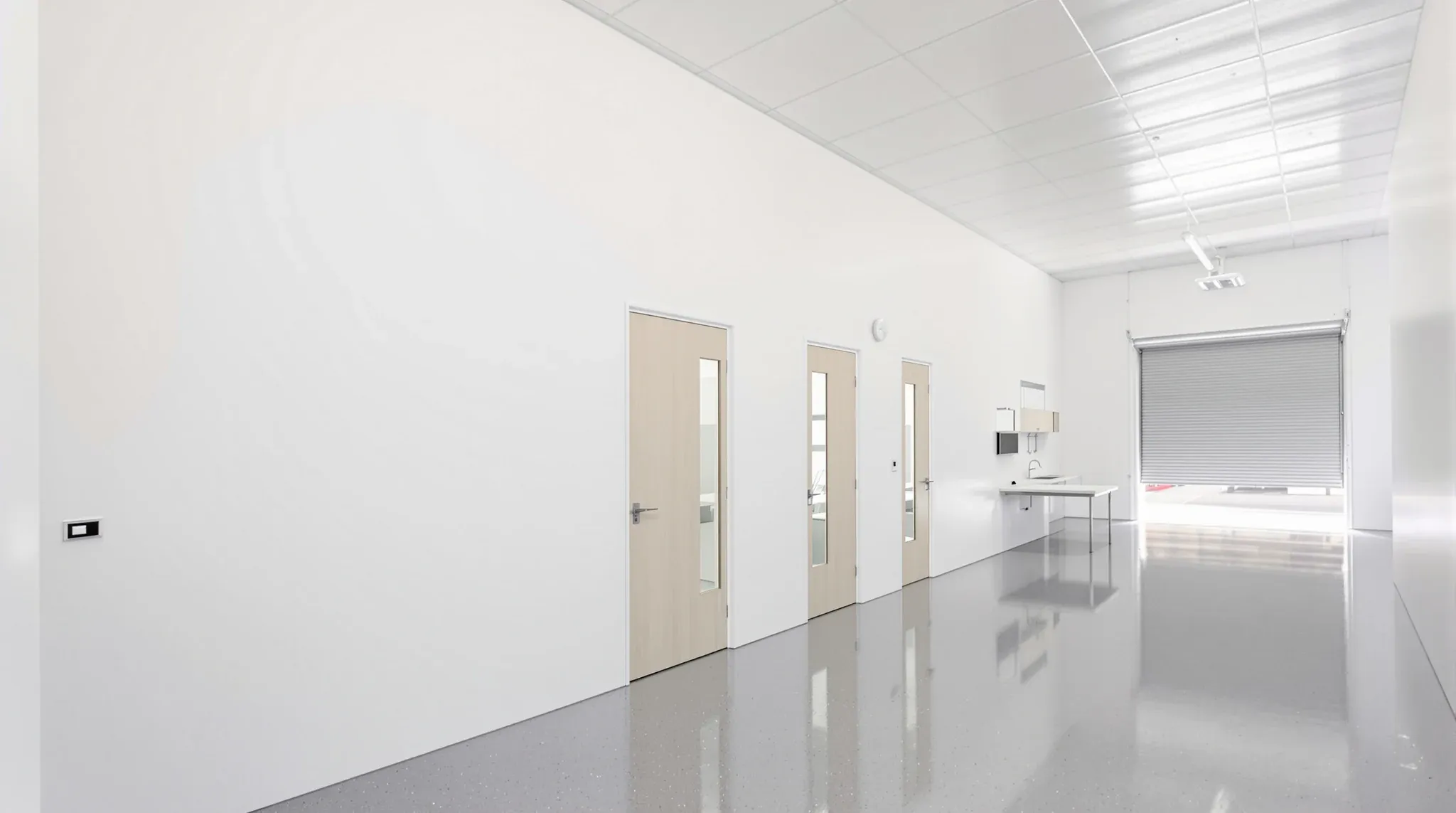 A new row of small plasterboard offices along the office end of a light industrial unit