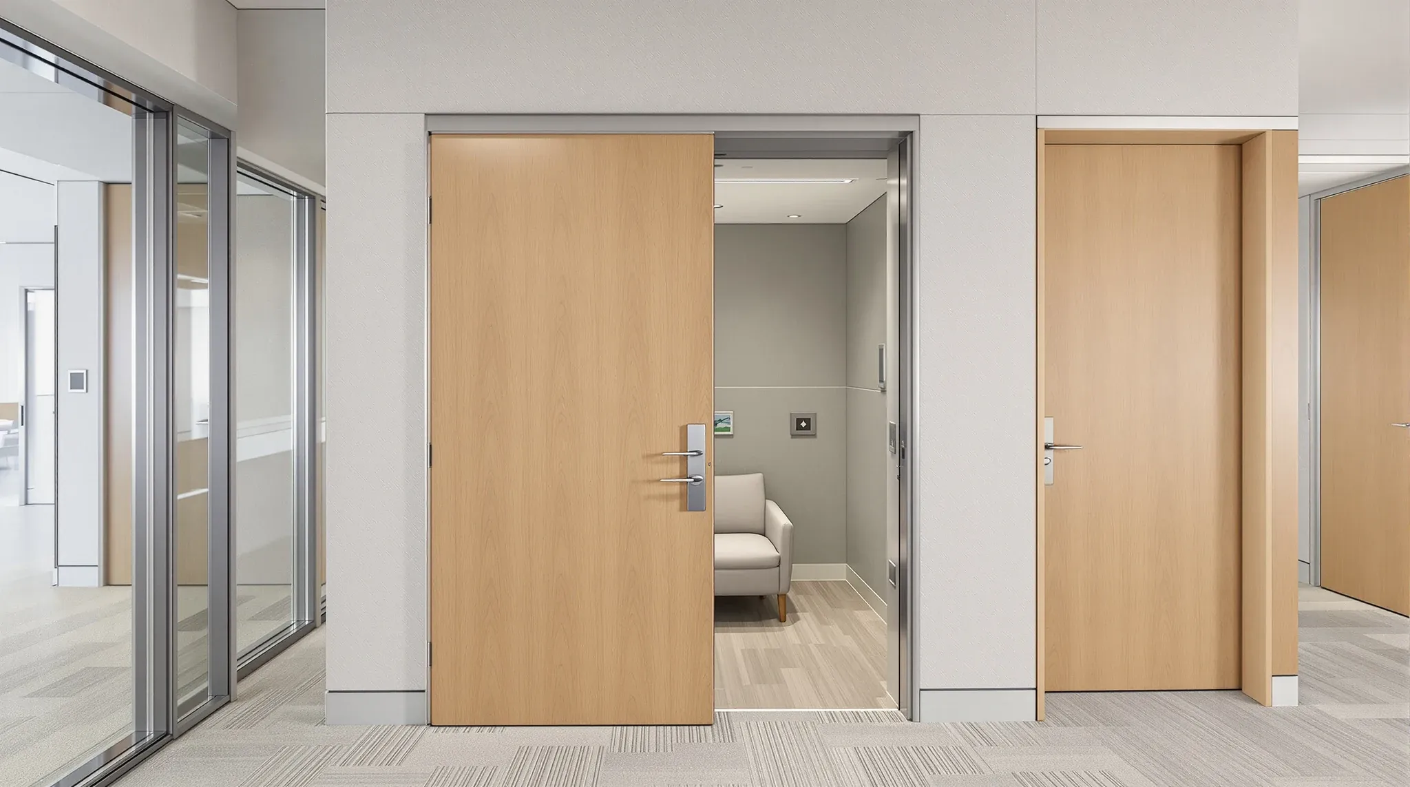 A small office room with its door retracted into the wall cavity beside it