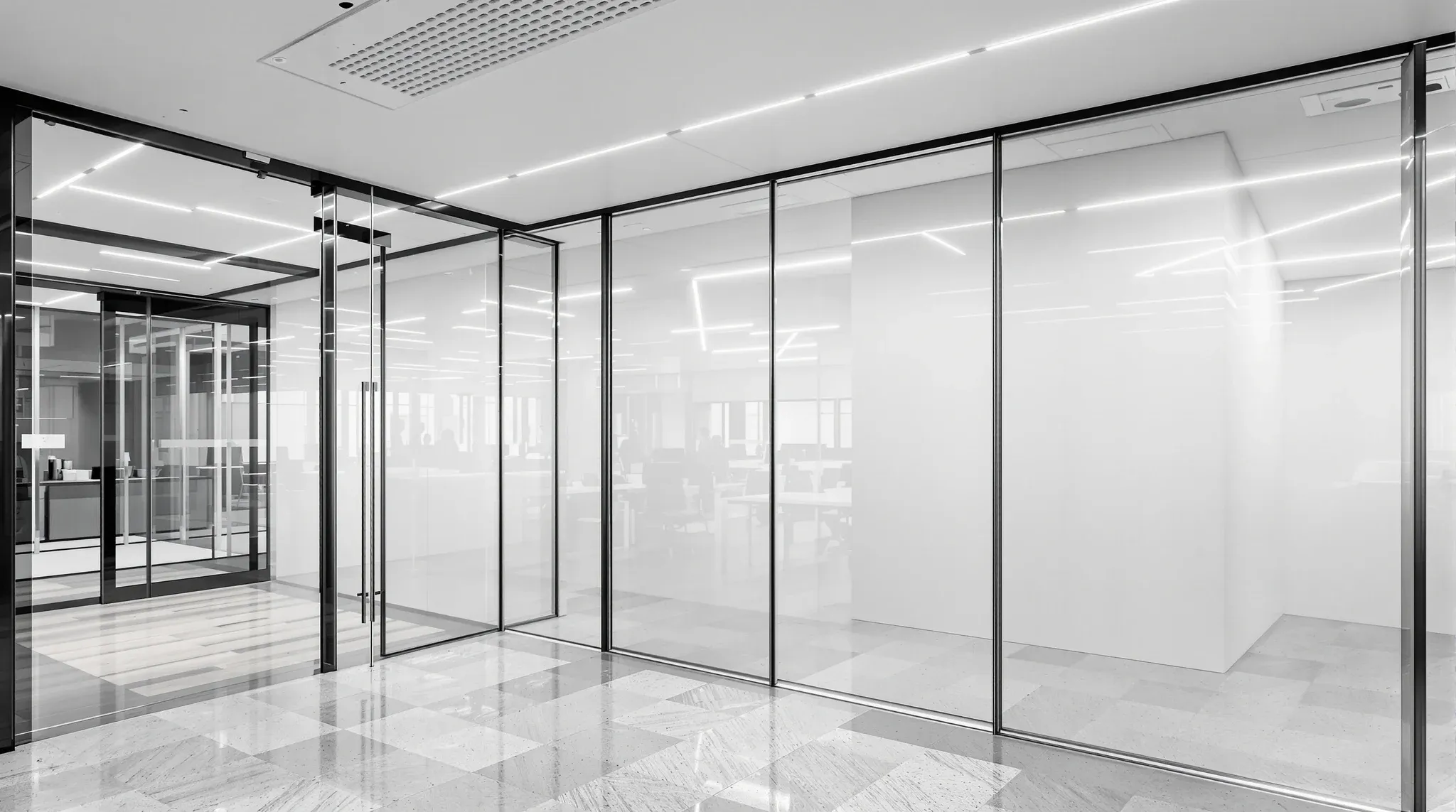 Newly fitted half-floor office tenancy with a plasterboard demising wall and glass entry off a shared lift lobby