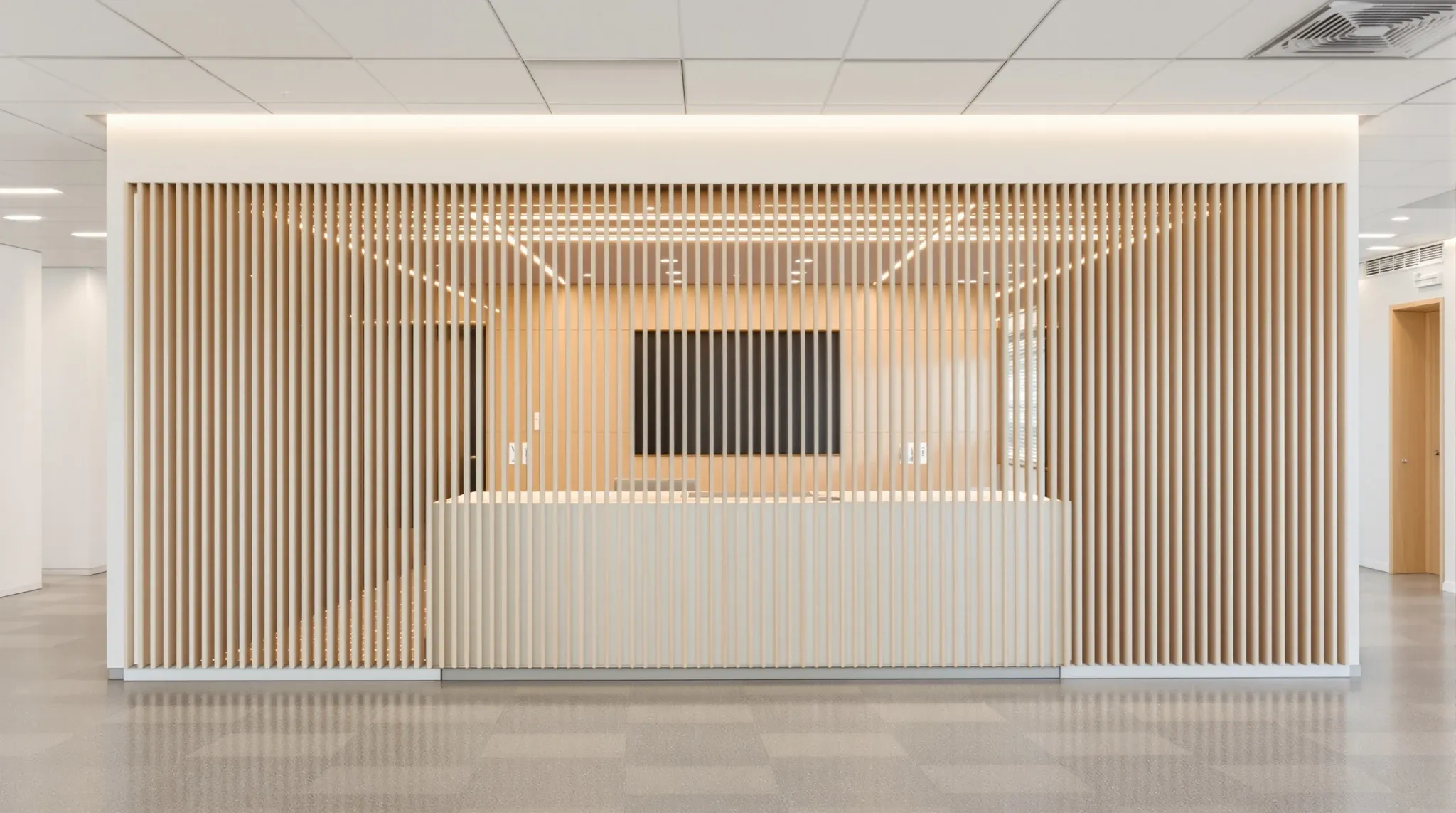Empty finished office reception wall with vertical timber slats and integrated lighting, no logo