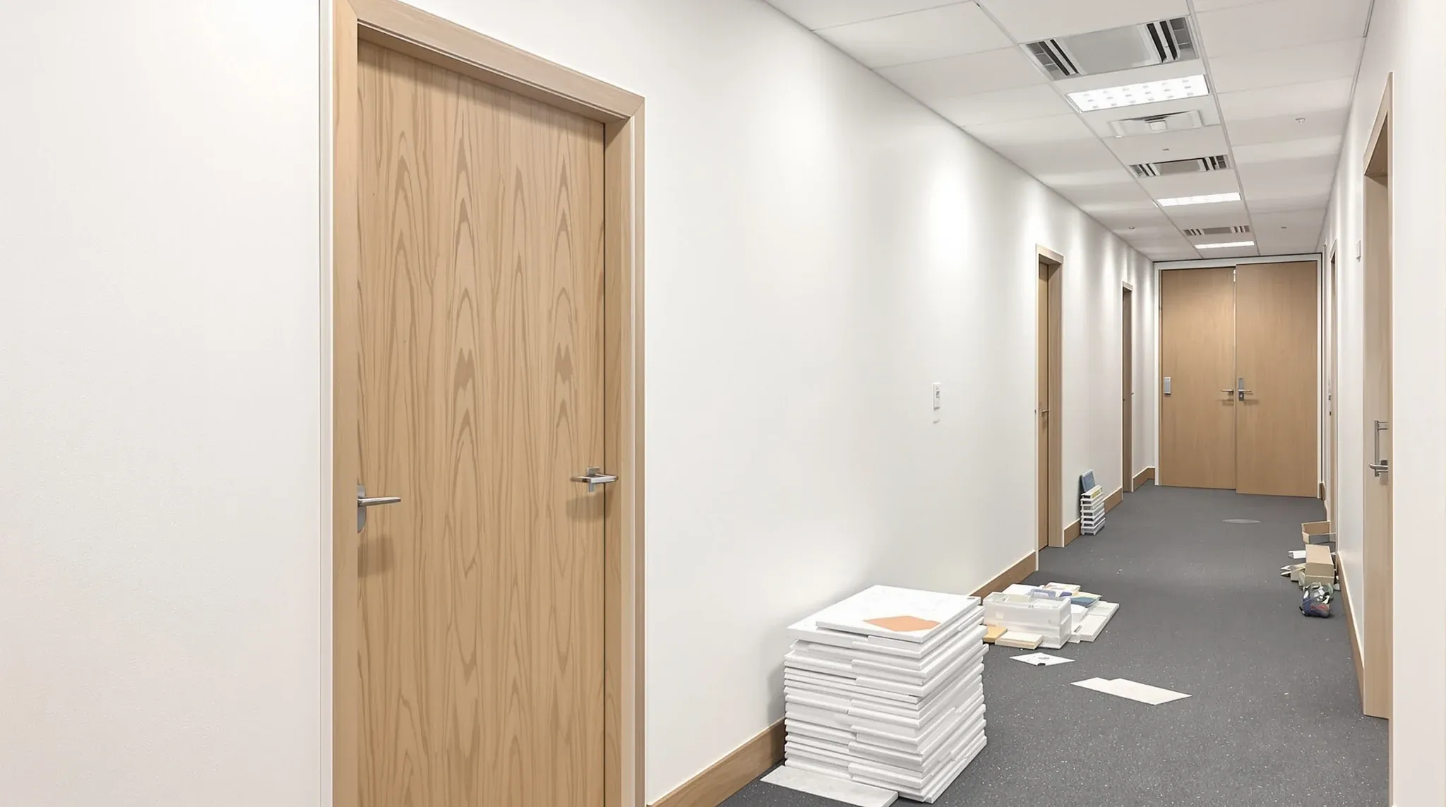 A freshly altered partition and doorway mid fit-out, showing a late change in the works